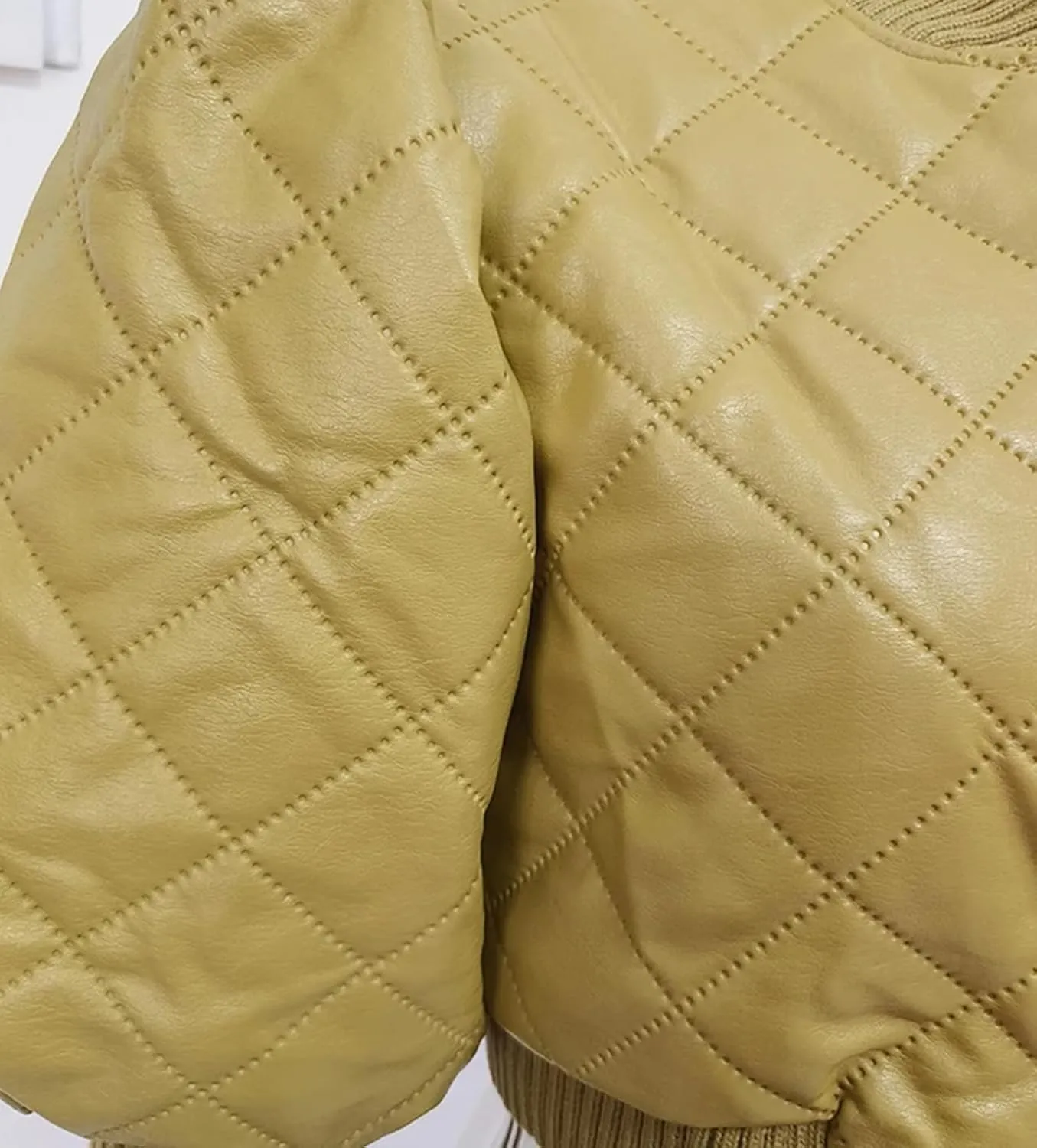 UIOKLMJH Women Covered Button Knitted Sleeve Leather Jacket Vintage High Street Style Stand Collar Coat